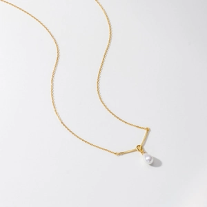 French style gold titanium steel necklace with V-shaped bar and teardrop pearl pendant