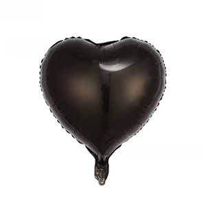 Detail of 18 inch heart shaped black foil balloon with glossy metallic finish surface