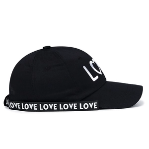 Black cotton baseball cap with white LOVE embroidery and long fashion logo ribbons