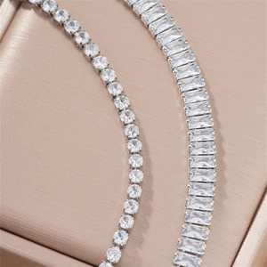Elegant crystal bridal jewelry set with round and rectangular cubic zirconia stones