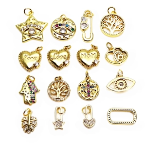 Set of 16 gold micro-pave zircon charms including heart, star, and evil eye for jewelry DIY