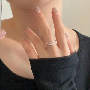 Detail of silver S925 sterling silver double-layer ring with geometric rectangle detail