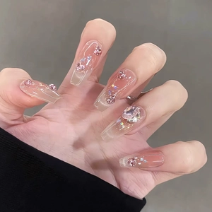 Pink gradient long coffin press-on nails with sparkling rhinestones and heart charms