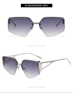 Detail view of silver semi-rimless sunglasses with hollow triangle temple design