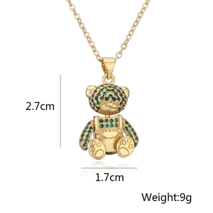 Detail showing 2.7cm x 1.7cm green crystal bear pendant measurements and 9g weight