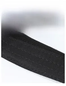 Detail of wide moisture-wicking sweatband with reinforced stitching on black sports hat