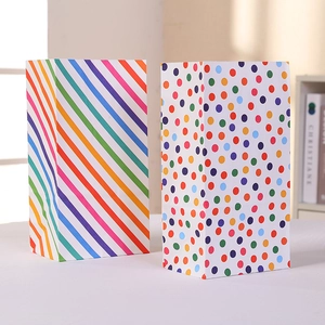 Rainbow striped and colorful polka dot kraft paper party favor bags for gifts