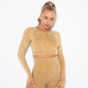 Detail view of the acid wash ginger yoga set featuring long sleeve top with thumb holes