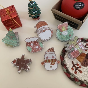 Weihnachts-Haarklammer-Set aus Acryl mit Glitzer-Weihnachtsmann-, Rentier- und Lebkuchenmotiven