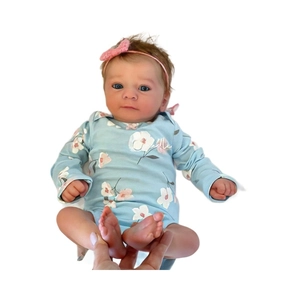 Realistic 18-inch reborn baby doll Felicia in blue floral onesie with pink bow headband
