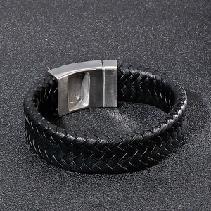 Detail of black braided leather bracelet with stainless steel 316L magnetic clasp