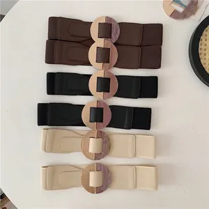Set of women's wide elastic waist belts in assorted colors with chic resin buckles