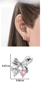 Detail of silver bow heart earring with pink zircon and exact dimensions 0.86cm