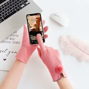 Pink thermal touchscreen gloves with fluffy pom-poms for winter outdoor and cycling