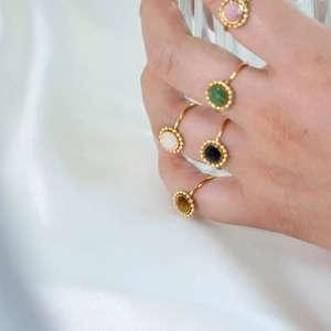 French vintage stainless steel rings set with colorful round natural stones on hands