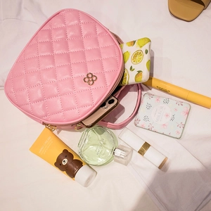 Pink quilted PU leather crossbody bag with clover buckle and golden chain strap