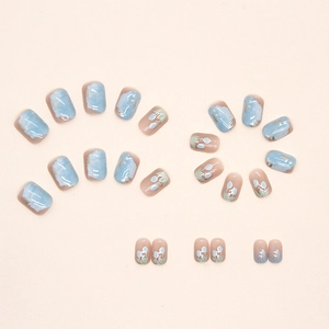 Blue oil painting tulip press-on nails with glossy watercolor finish and gold foil accents