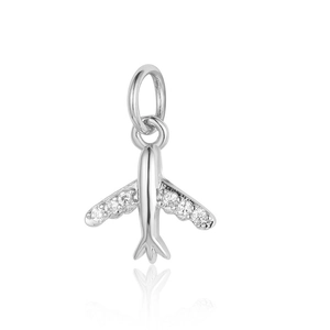 Detailed view of a silver airplane charm with sparkling crystals and a white background