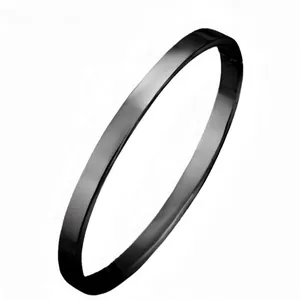 Polished black stainless steel bangle with mirror finish and minimalist circular design