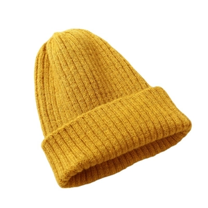 Minimalist yellow ribbed knit beanie for kids winter warmth on a white background