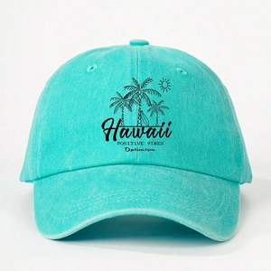 Detail of Hawaii embroidery and positive vibes print on washed cotton baseball cap