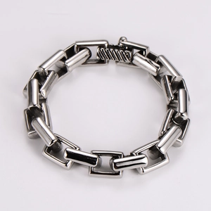 Macro shot of 12mm stainless steel bamboo link bracelet with industrial buckle clasp