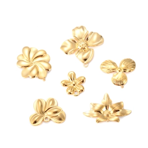 Detailed view of six 18k gold-plated flower pendants with DIY hooks for jewelry making