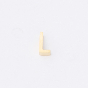 Detailed view of polished golden letter L bead charm with a 1.8mm hole for jewelry
