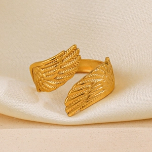 Adjustable golden stainless steel ring featuring detailed angel wing feather design