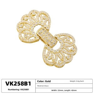Detail of gold brass bow clasp with cubic zirconia for DIY pearl necklace and bracelet