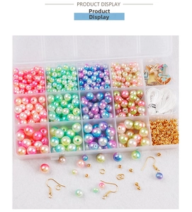 DIY jewelry kit featuring gradient faux pearls, colorful beads, and assorted charms in a 15-grid box