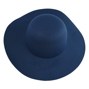 Detail of wide brim navy blue wool felt fedora with a smooth round top and fine texture