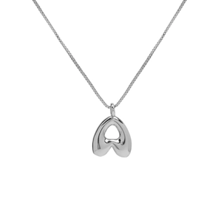 Polished silver balloon bubble letter A necklace with metallic heart pendant on white base