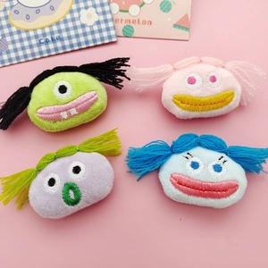 Cartoon monster plush brooches in four colors with embroidery for DIY crafts and decor