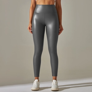 Close-up of grey high-waisted faux leather leggings with matte metallic texture