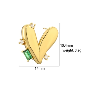 Detailed view of heart-shaped earring with green gem, 15.4mm x 14mm size and 3.2g weight