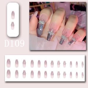 Detail showing 24pcs pink silver glitter gradient press-on nails with rhinestones and bows