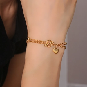 Golden double-layer stainless steel bracelet with OT toggle clasp and heart charm