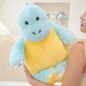 Close-up of soft blue dinosaur plush toy held by a model showing its large size and texture
