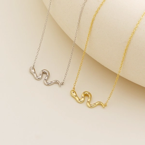 Luxurious S925 silver snake pendant necklaces with pavé diamonds in gold and silver tones