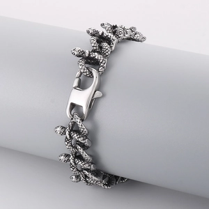 Vintage silver snake scale link bracelet for men with lobster clasp on display