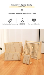 Linen jewelry display set featuring necklace busts and multi-tier ring holder stands