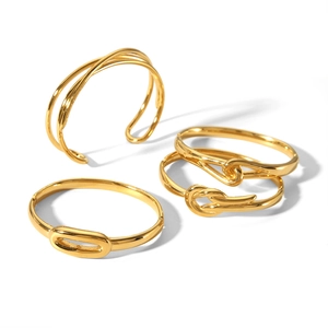 Set of 18k gold plated stainless steel bangles in minimalist geometric line designs