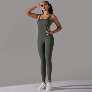 Detail of dark olive green ribbed seamless yoga jumpsuit with slim fit texture
