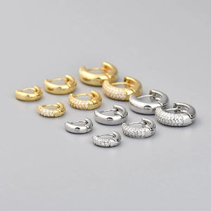 Polished and cubic zirconia paved hoop earrings set in various sizes and finishes
