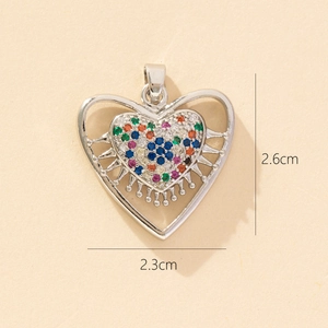 Detail view of hollow heart pendant with multi-colored zircons and dimensions 2.6cm x 2.3cm