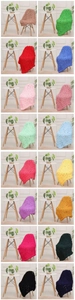 Detailed color selection showing 16 shades of chunky hand-knitted chenille throw blankets