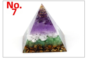 Detailed top view of handmade Orgonite pyramid with tiger eye and green aventurine