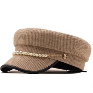 Khaki corduroy newsboy cap with elegant pearl chain and black leather trim visor