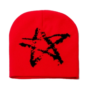 Red knit beanie with distressed black star pattern for winter outdoor warmth
